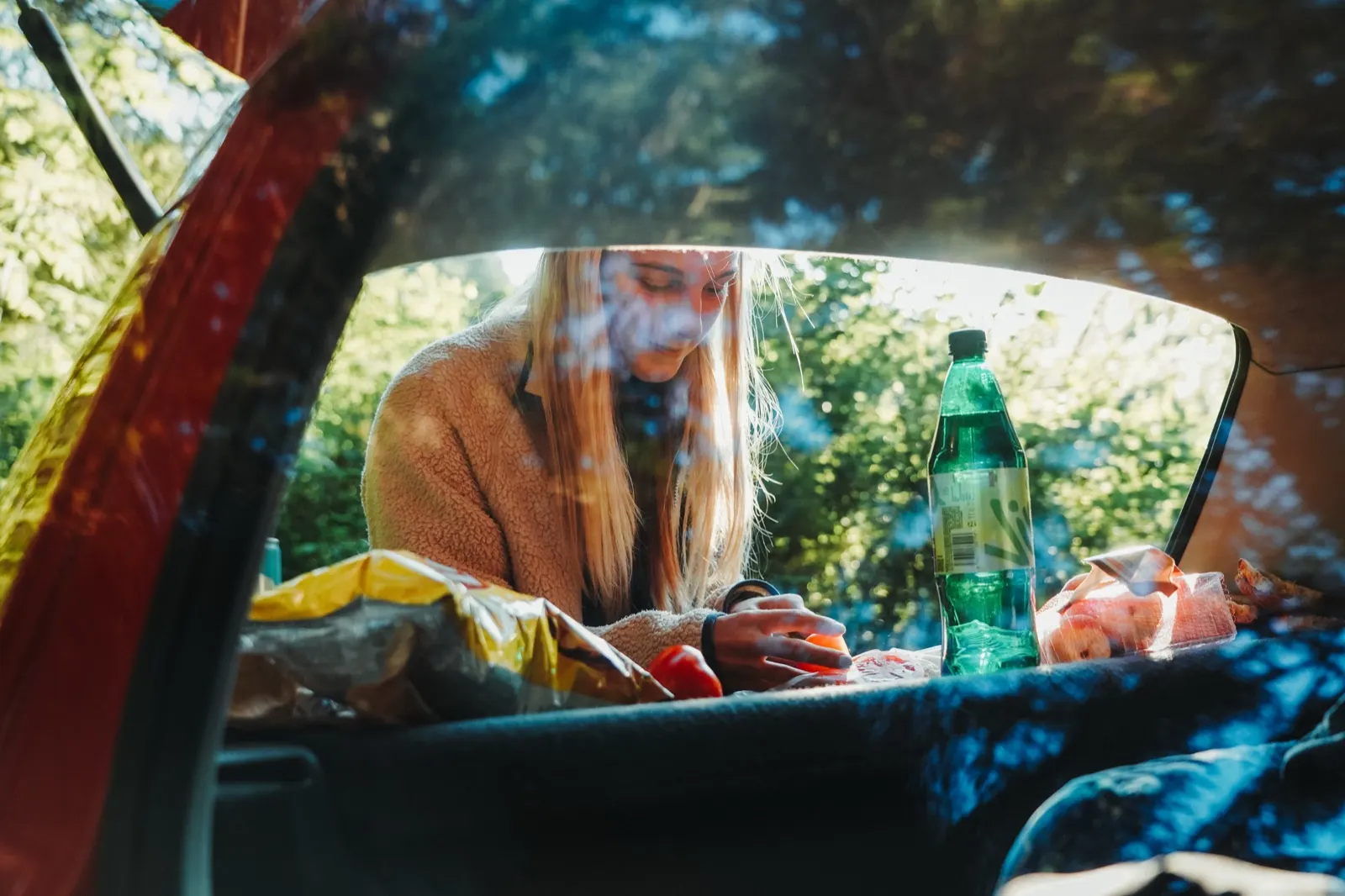 Camping next to the car in the forest